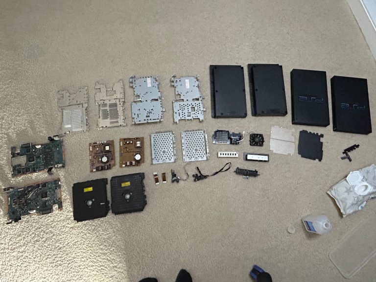 2 disassembled PS2s