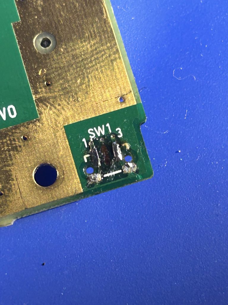 Removing original eject button (I accidentally ripped off a pad